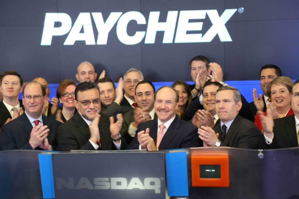 The Paychex proud team ringing the Nasdaq bell